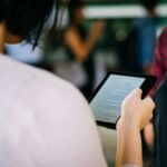 Literotica - woman reading Kindle