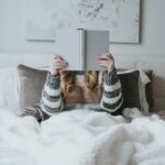 Literotica - woman reading in bed