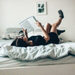 Best literotica- woman reading in bed