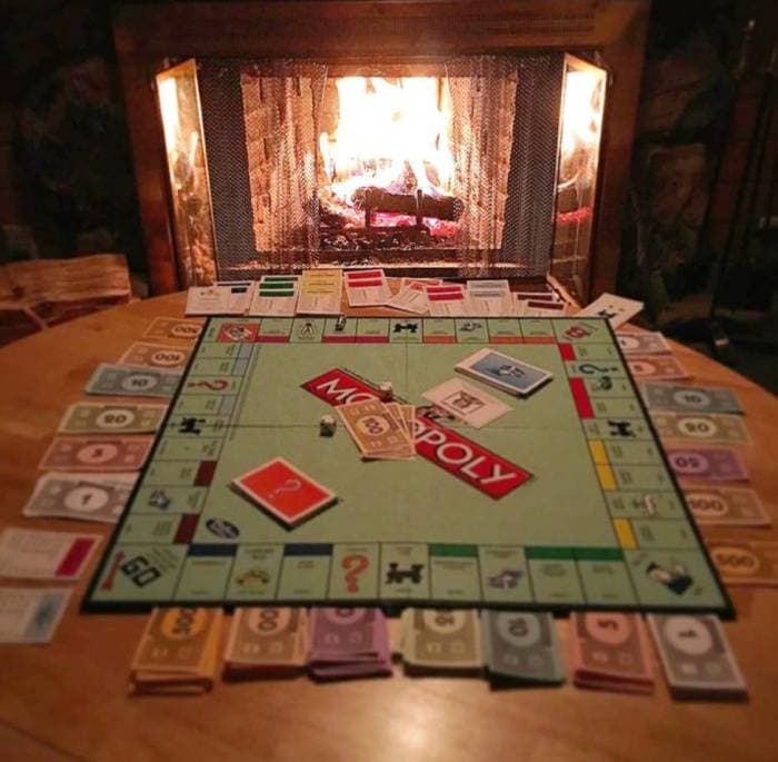 Fun Winter Activities - monopoly game by fire