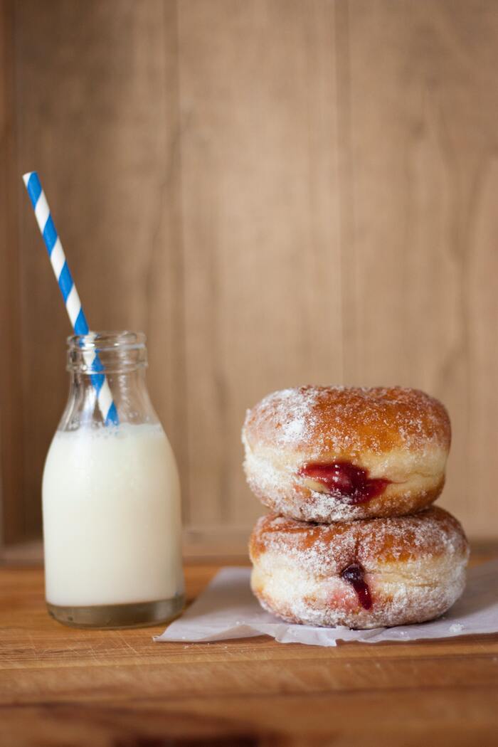 Paczki- two paczkis with milk