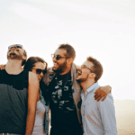 Polycule meaning- four people laughing