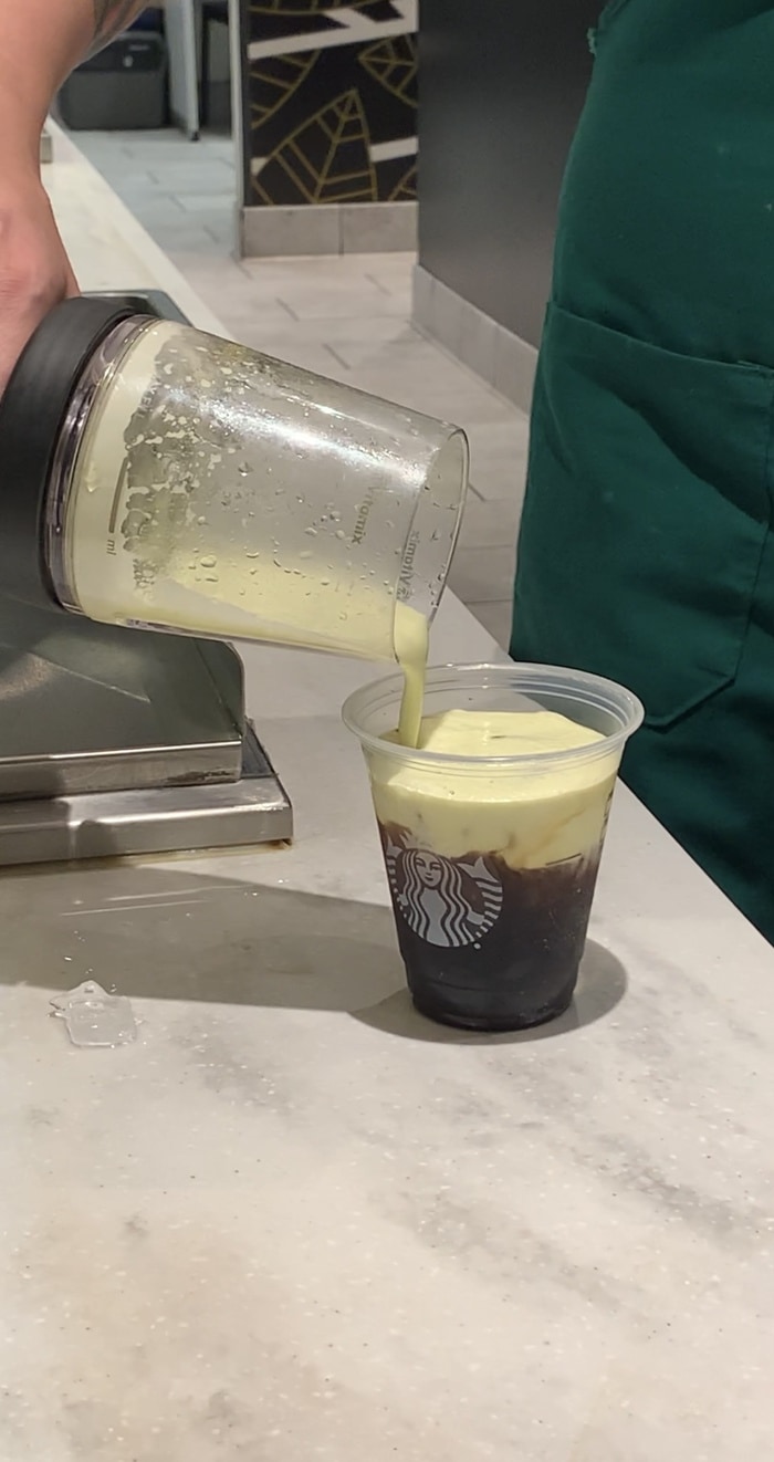 Starbucks Oleato Review - Oleato Golden Foam Cold Brew Coffee pouring