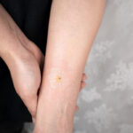 Flower tattoos- White Ink Flower Tattoo
