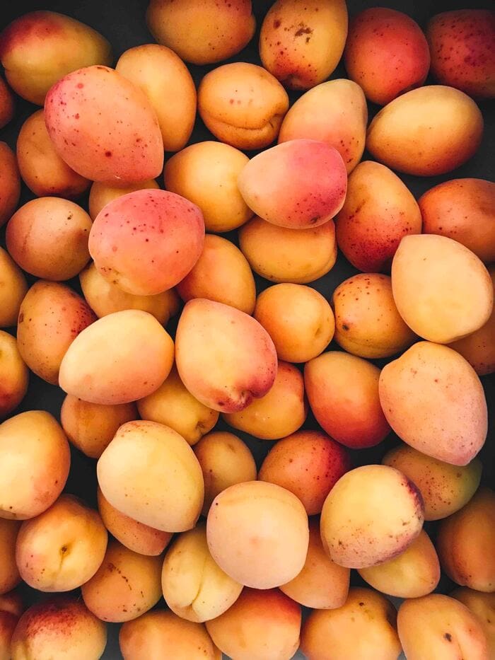 Peach Puns - pile at market