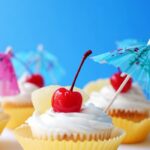 coconut recipes - Pina Colada Cupcakes with Coconut Frosting