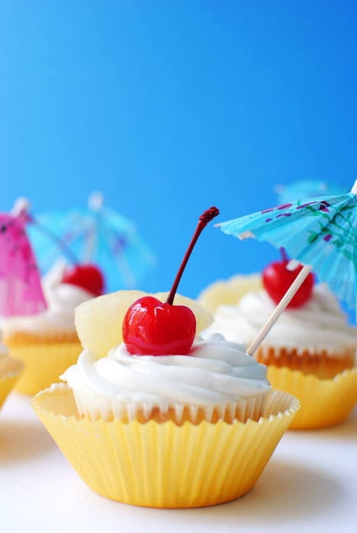 coconut recipes - Pina Colada Cupcakes with Coconut Frosting