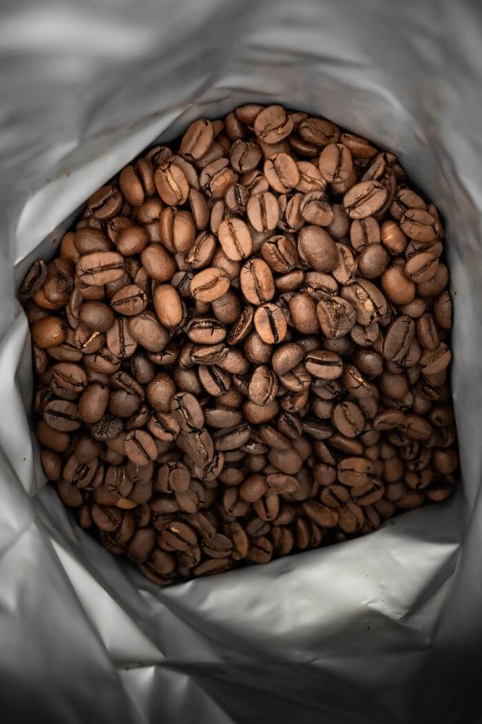 how is decaf coffee made - bag of roasted coffee beans