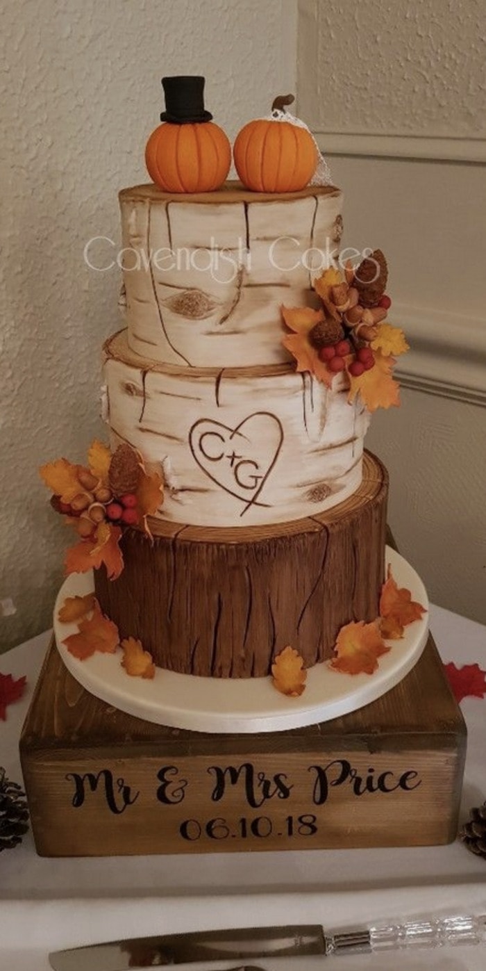 fall wedding cakes - initials cared in birch stump
