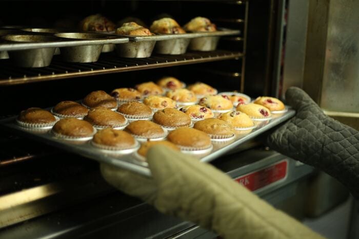 Baking Tips for Beginners - baker checking if cupcakes are done