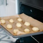 Baking Tips for Beginners - baker using parchment paper