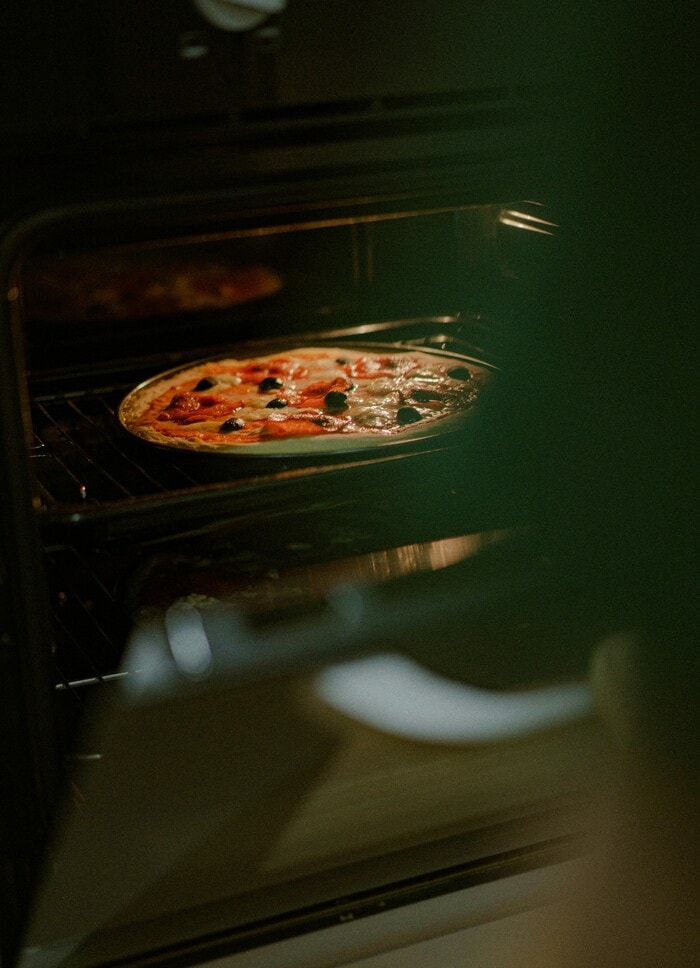 Baking Tips for Beginners - baker opening oven