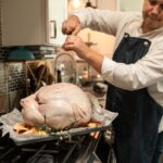 thanksgiving tips - turkey being prepped