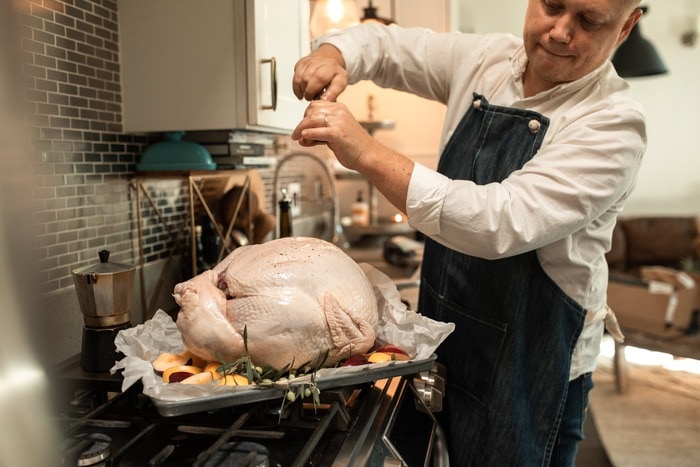 thanksgiving tips - turkey being prepped