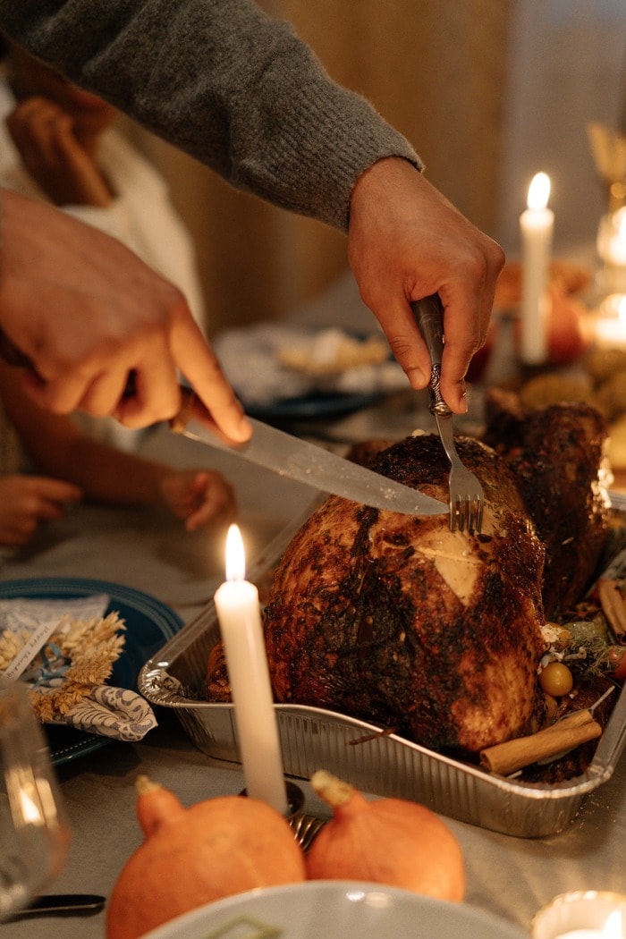 thanksgiving tips - turkey being carved