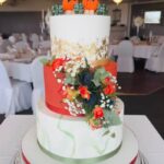 Winter Wedding Cake Designs - Orange We Glad It's Winter Cake
